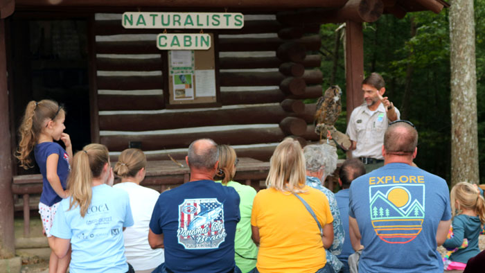 Image of a crowd attending an educational show at the Hocking Hills State Park in Ohio.